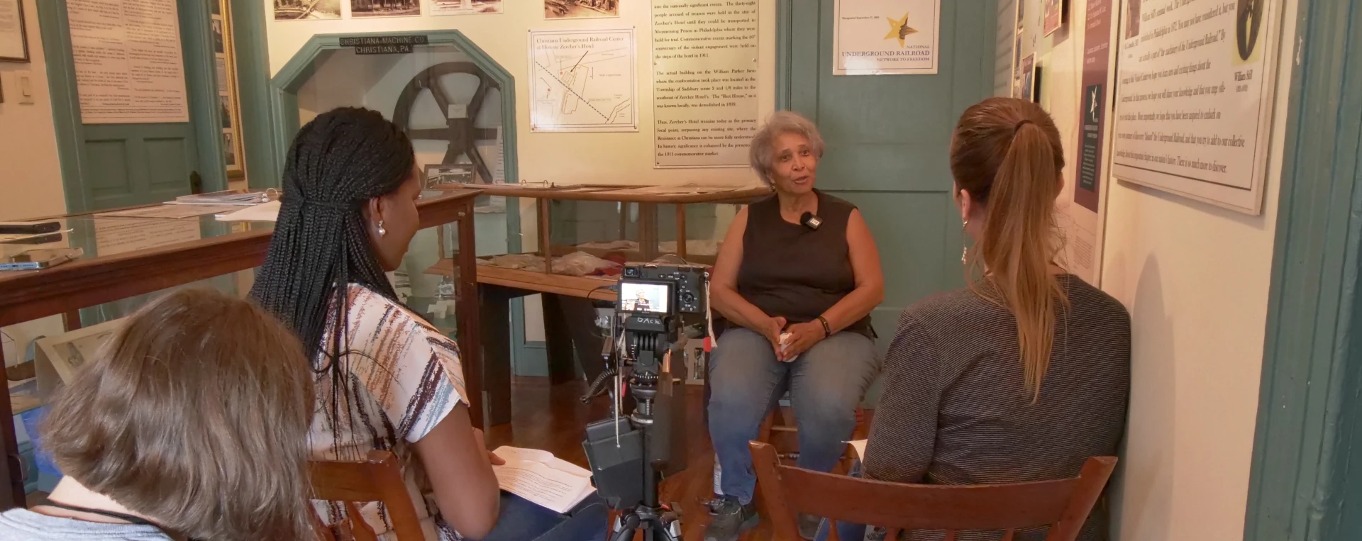 3 women participating in an oral history interview on camera